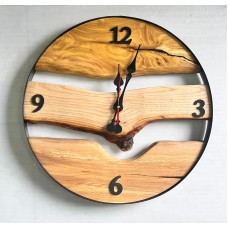 ساعة حائط خشبية  بإطار معدني